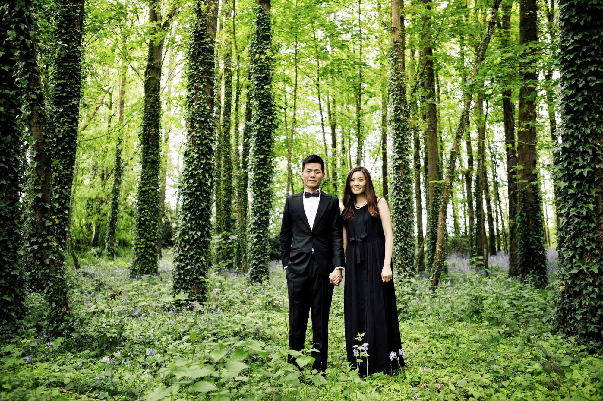 couple in the forest of chateau challain