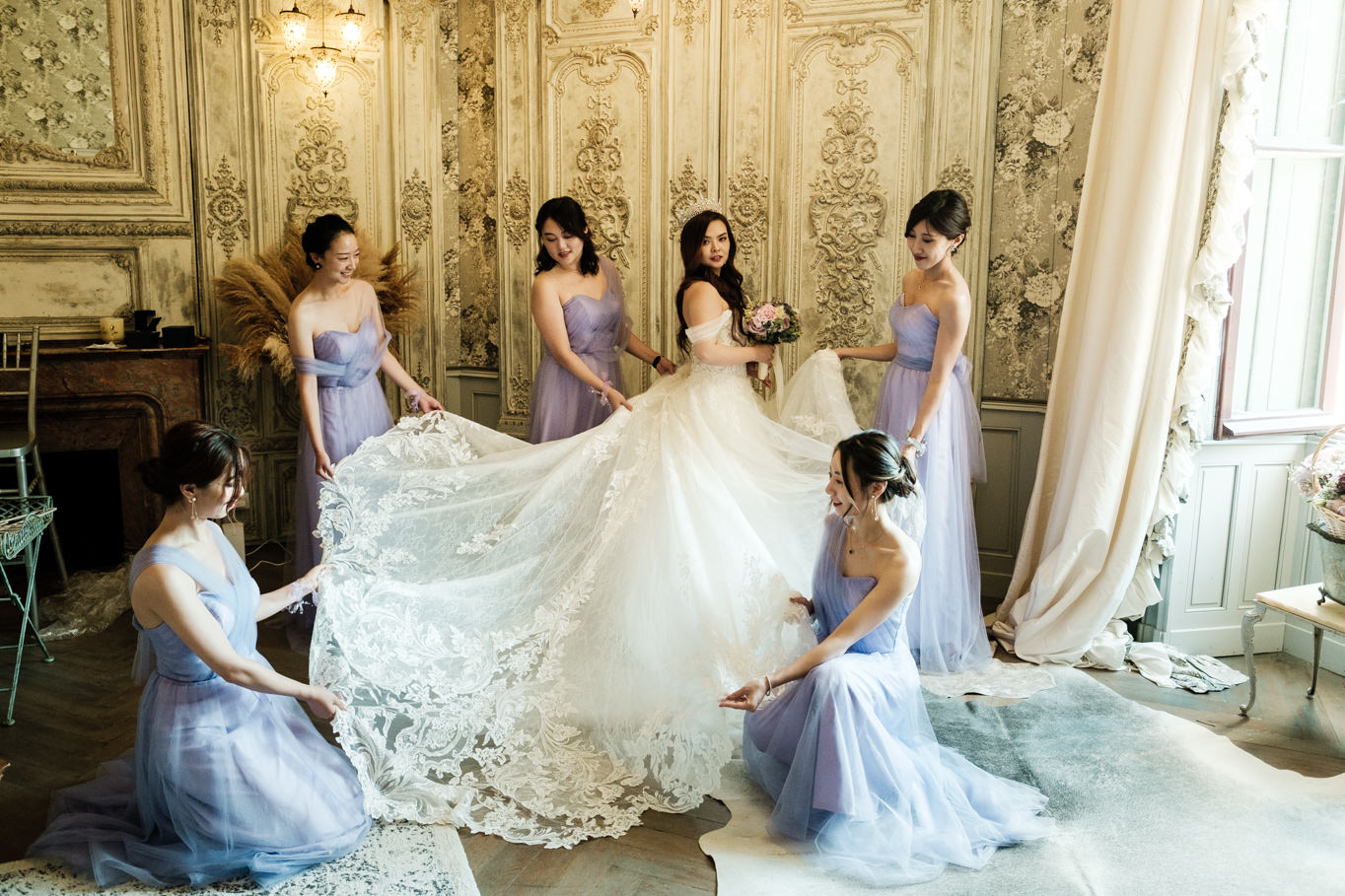bride with bridesmaids chateau challain